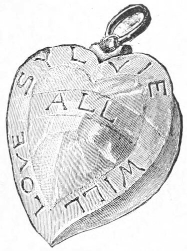 A locket in shape of a heart, with “All will love Sylvie” written on it, spiralling from to the middle to top.