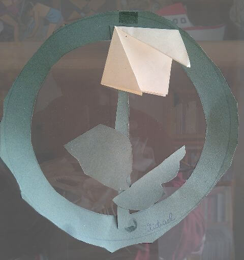 Gebasteltes Schneeglöckchen in rundem Rahmen